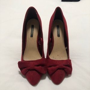 Red High Heels with Bows